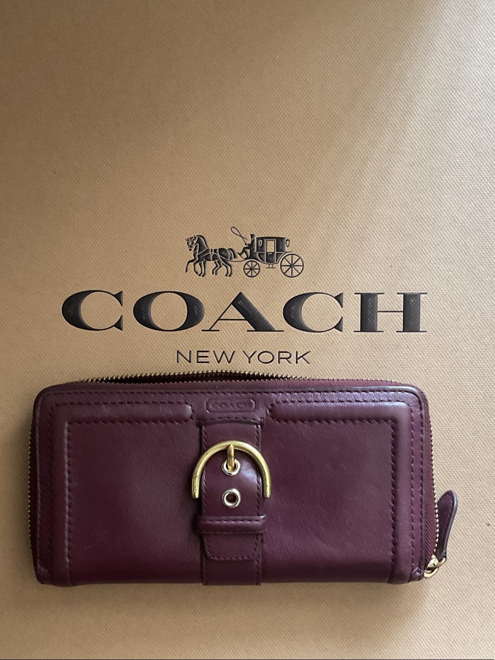 Coach SoHo burgundy Leather Zip-Around Wallet with Buckle Accent - Brown